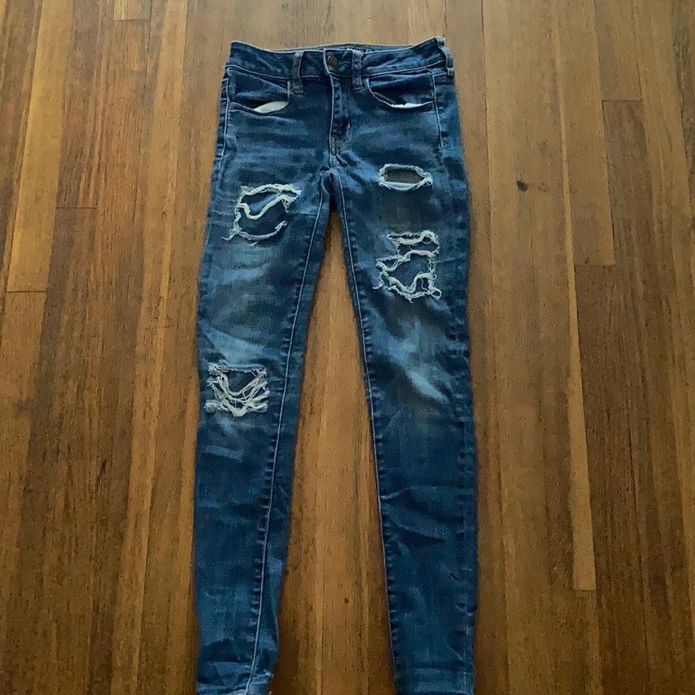 American Eagle ripped patched jeans